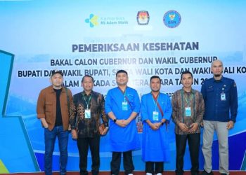 Pasangan balon bupati dan wakil bupati, Hendriyanto Sitorus dan Samsul Tanjung, mengikuti tes kesehatan.