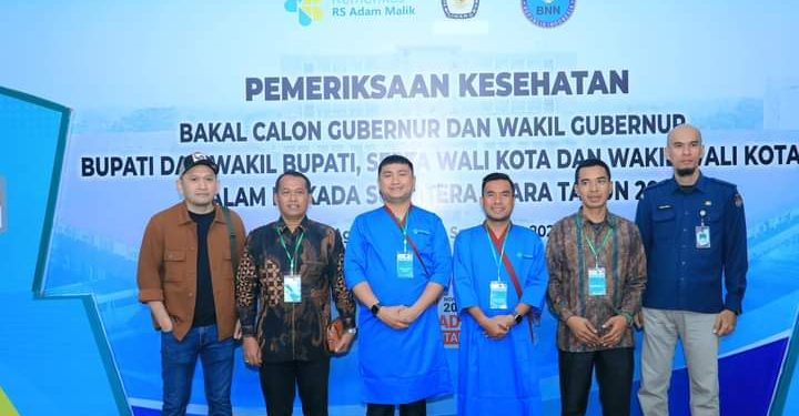 Pasangan balon bupati dan wakil bupati, Hendriyanto Sitorus dan Samsul Tanjung, mengikuti tes kesehatan.