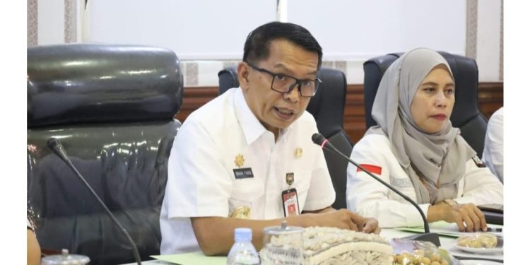 Pjs Walikota Tanjungbalai Baharuddin Pabba, M.Si di dampingi Sekdako Tanjungbalai Nurmalini Marpaung, M.Ikom.