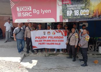 Personel Polsek Tanjungbalai Utara Kunjungi Warga di Pojok Pilkada