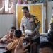 Kapolres Asahan Memberikan Makan Bergizi Kepada Siswa Siswi di SD Tanjung Alam