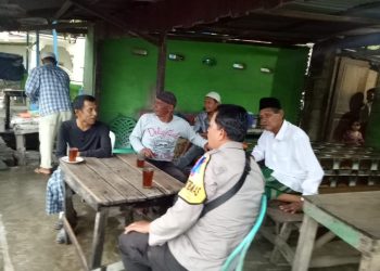 Personel Polsek Tanjungbalai Utara Sampaikan Pesan Kamtibmas ke Warga