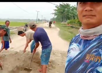 Kades Panca Arga Ajak Warga  Perbaiki Jalan Penghubung Asahan-Batubara