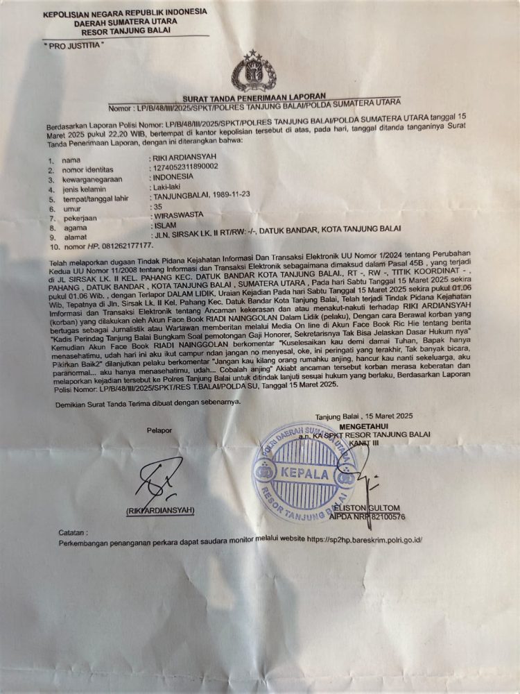 Surat laporan ke polisi.