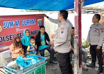 Personel Polsek Teluk Nibung Gelar Jumat Curhat dengan Warga