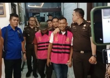 Ditahan Kejari Asahan,  Tersangka Kasus Dugaan Korupsi Dana Desa Tersenyum