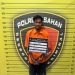 Tersangka saat di kantor polisi.
