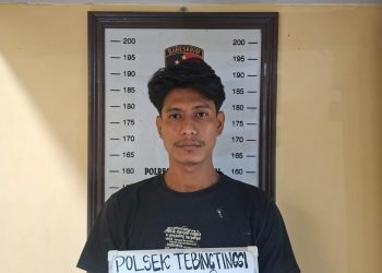 Tersangka penganiayaan saat di kantor polisi.