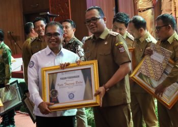 Pemko Tanjungbalai Terima UHC dan Sertifikat DBH