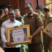 Pemko Tanjungbalai Terima UHC dan Sertifikat DBH