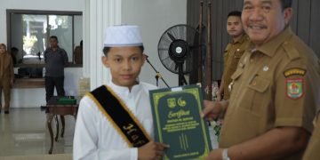 Bupati Asahan Wisuda 48 Santri Lembaga Tahfidz Al-Qur’an Pemkab Asahan