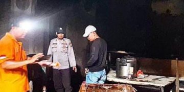 Personel Polres Tanjungbalai Amankan Lokasi Kebakaran Ruko Bale Coffee & Fitness
