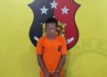 Tersangka saat diamankan di Mapolsek Kualuh Hulu. 