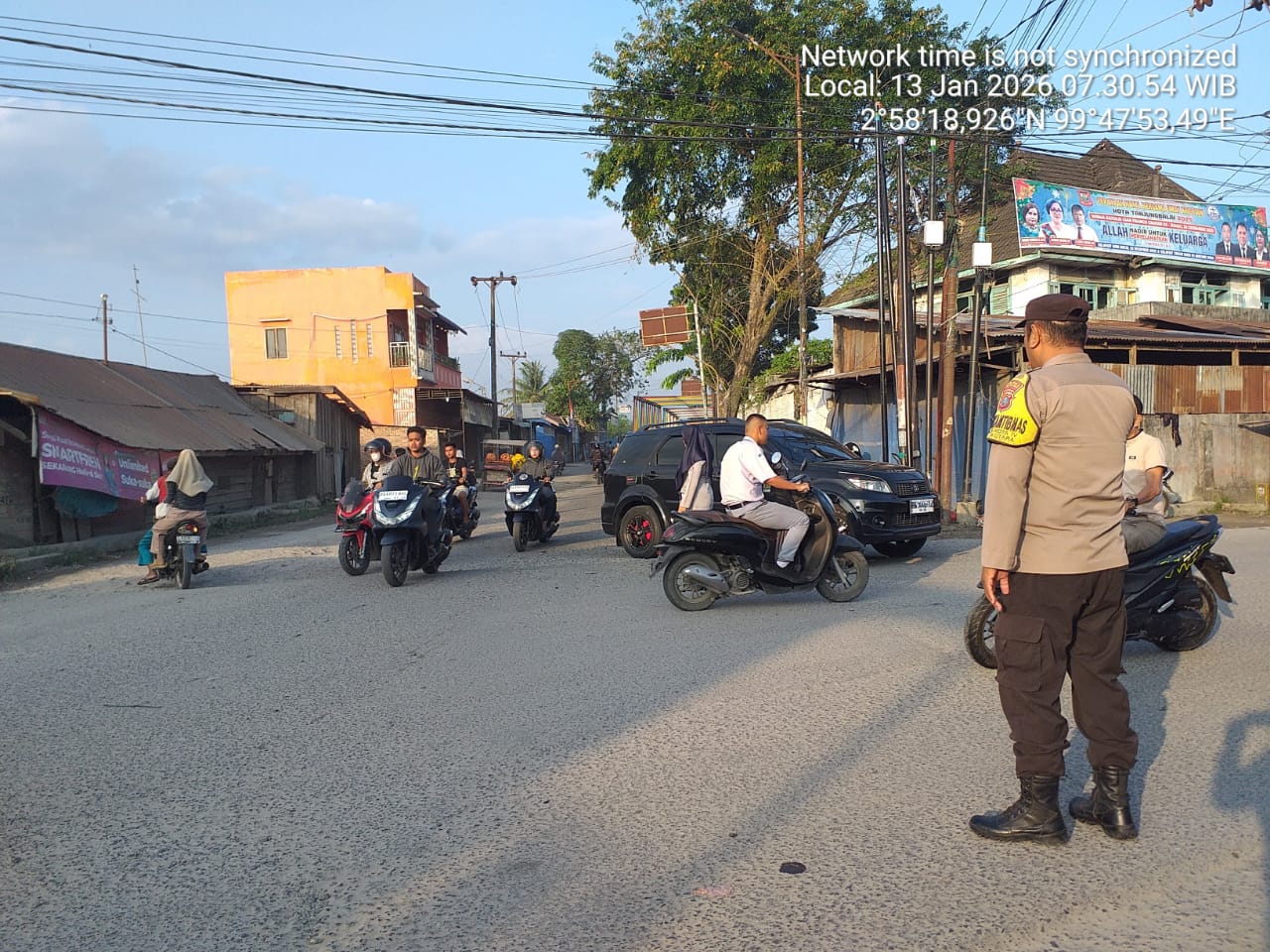 Personel Satlantas Polres Tanjungbalai Amankan Lalu Lintas