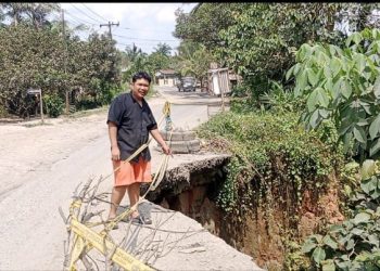 Sudah Dua Tahun Jalan Penghubung Antar Kabupaten di Kecamatan Bandar Paser Mandoge Longsor