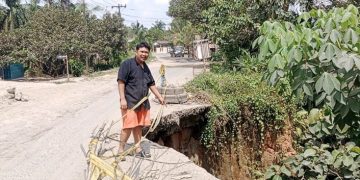 Sudah Dua Tahun Jalan Penghubung Antar Kabupaten di Kecamatan Bandar Paser Mandoge Longsor