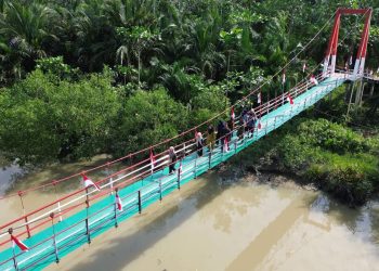 Kodim 0208/AS Rampungkan Rehab Jembatan Gantung Desa Jati Mulia
