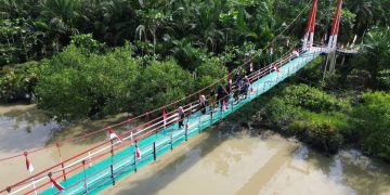 Kodim 0208/AS Rampungkan Rehab Jembatan Gantung Desa Jati Mulia