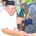 Wakil Bupati Labuhanbatu H Jamri saat disambut warga.