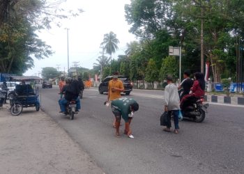 Pengunjung di Alun-alun Kisaran Dipaksa Beli Masker Rp5 Ribu