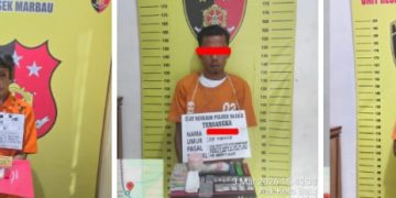Ketiga tersangka saat di kantor polisi.