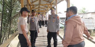 Kapolres Tanjungbalai Letakkan Batu Pertama Renovasi Jembatan Merah Putih 