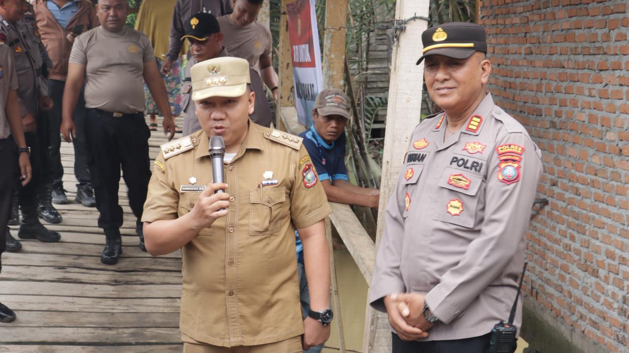 Kapolres Tanjungbalai Letakkan Batu Pertama Renovasi Jembatan Merah Putih 