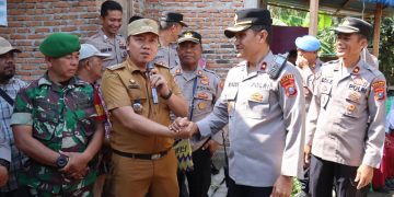 Polres Tanjungbalai Serahkan “Jembatan Merah Putih” Kepada Warga Kelurahan Sei Merbau