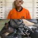 Tersangka saat di kantor polisi.